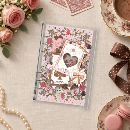 Pink Playing Cards shaker binder on a styled desk