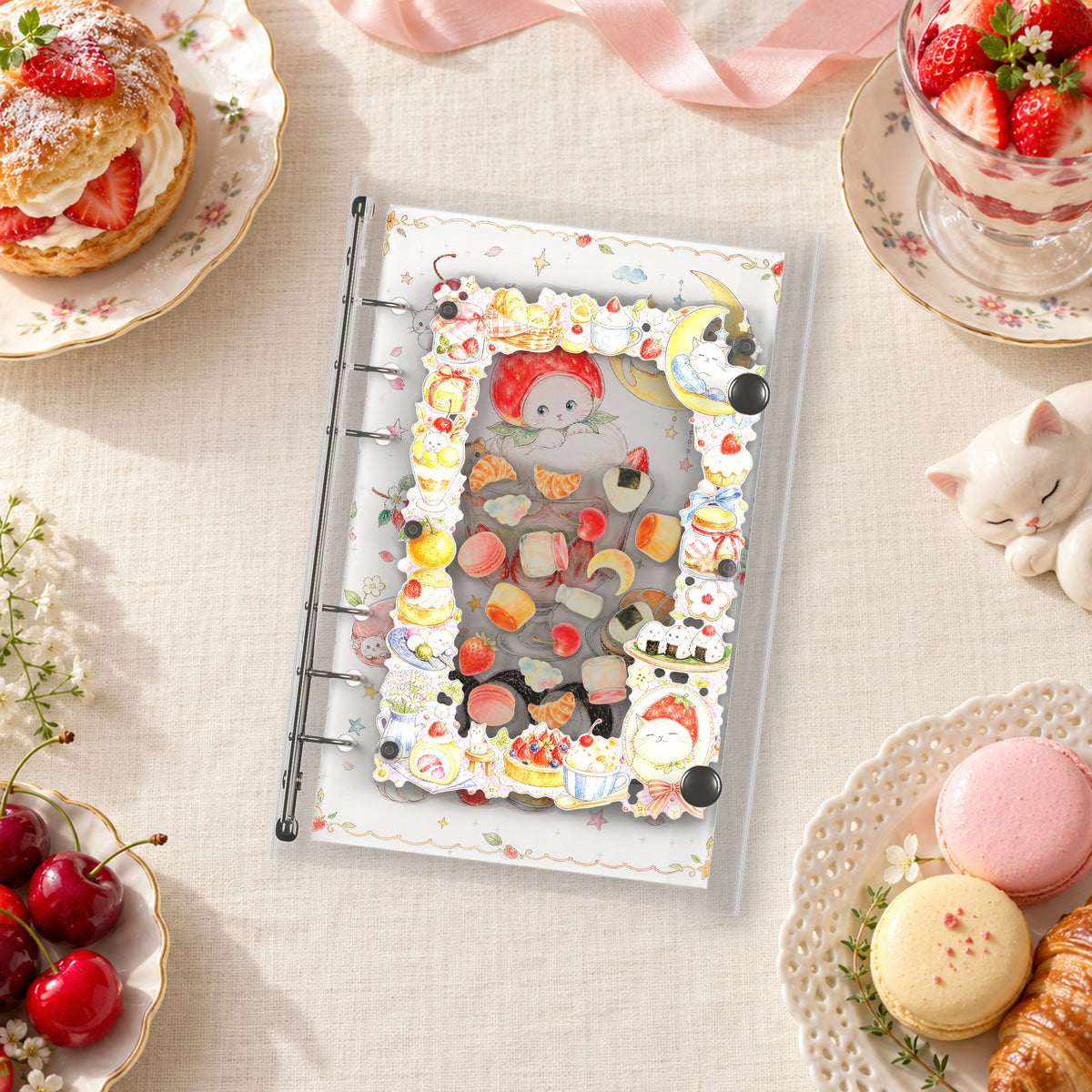 Strawberry Cat Sweets shaker binder on a styled desk