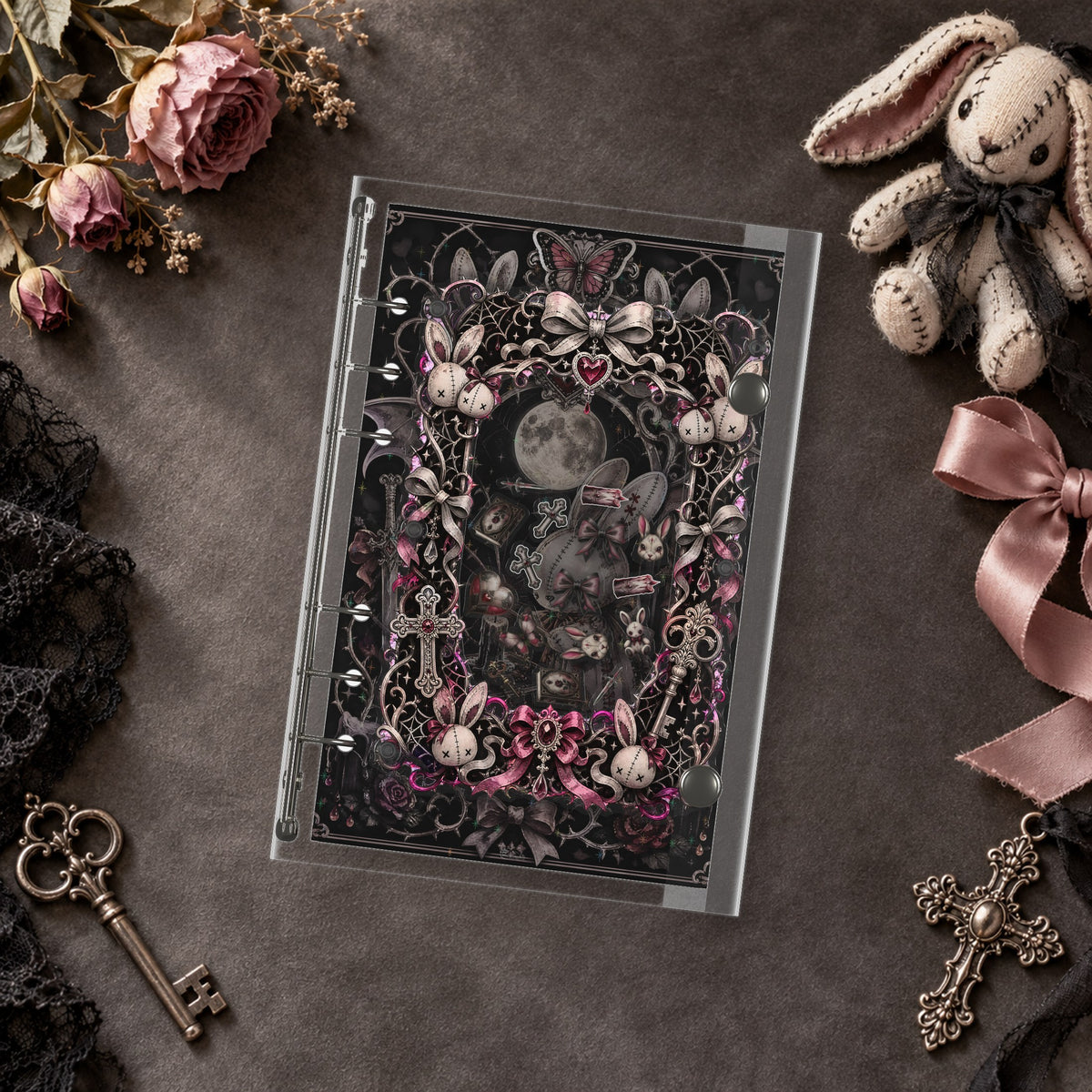 Gothic Rabbit Doll shaker binder on a styled desk