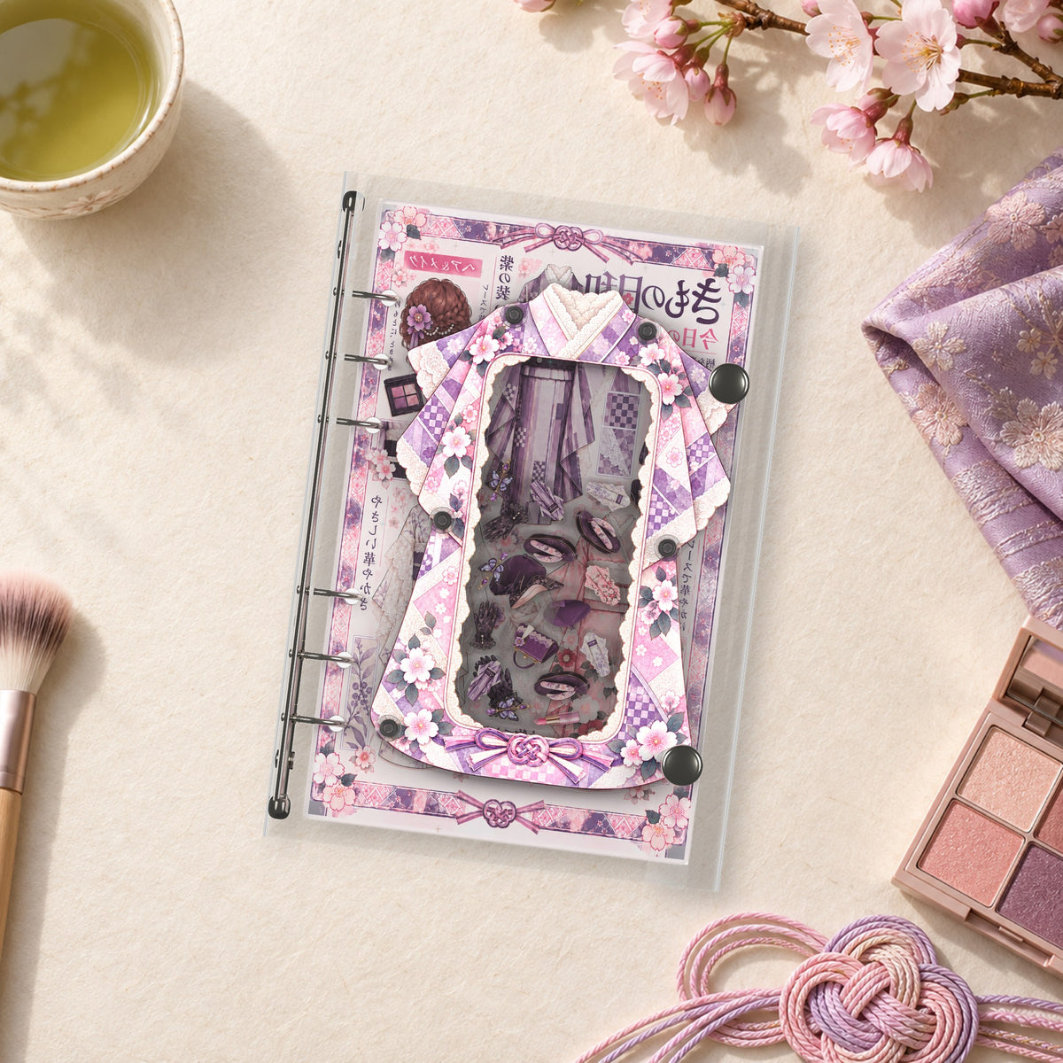 Kimono Collage shaker binder on a styled desk