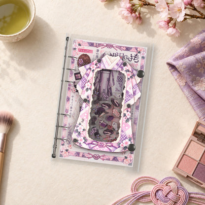 Kimono Collage shaker binder on a styled desk