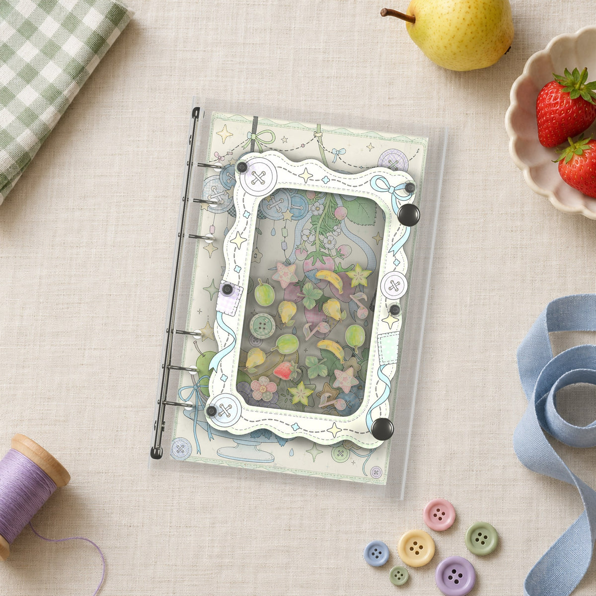 Pastel Fruit Patches shaker binder on a styled desk