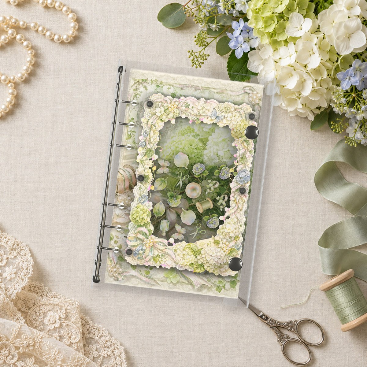 White Hydrangea shaker binder on a styled desk