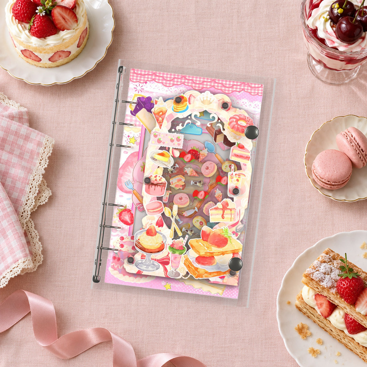 Pink Patisserie shaker binder on a styled desk