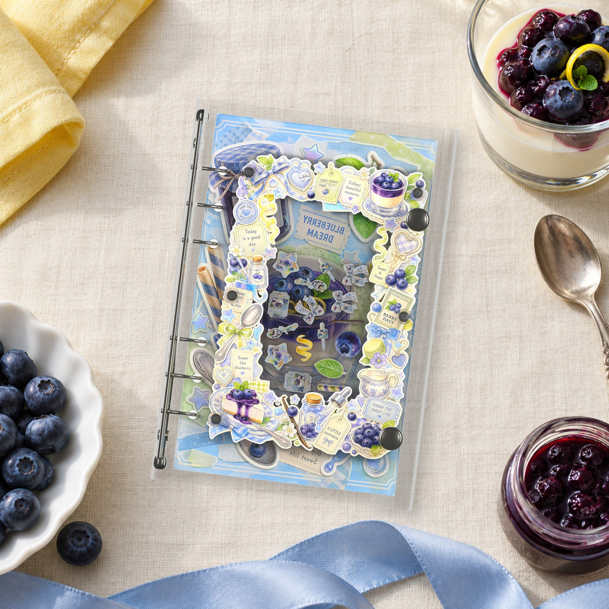 Blueberry Panna Cotta shaker binder on a styled desk