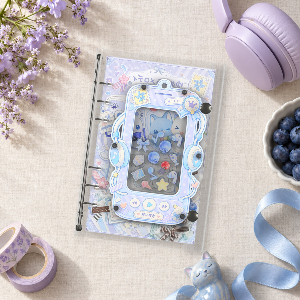 Lavender Cat Playlist shaker binder on a styled desk
