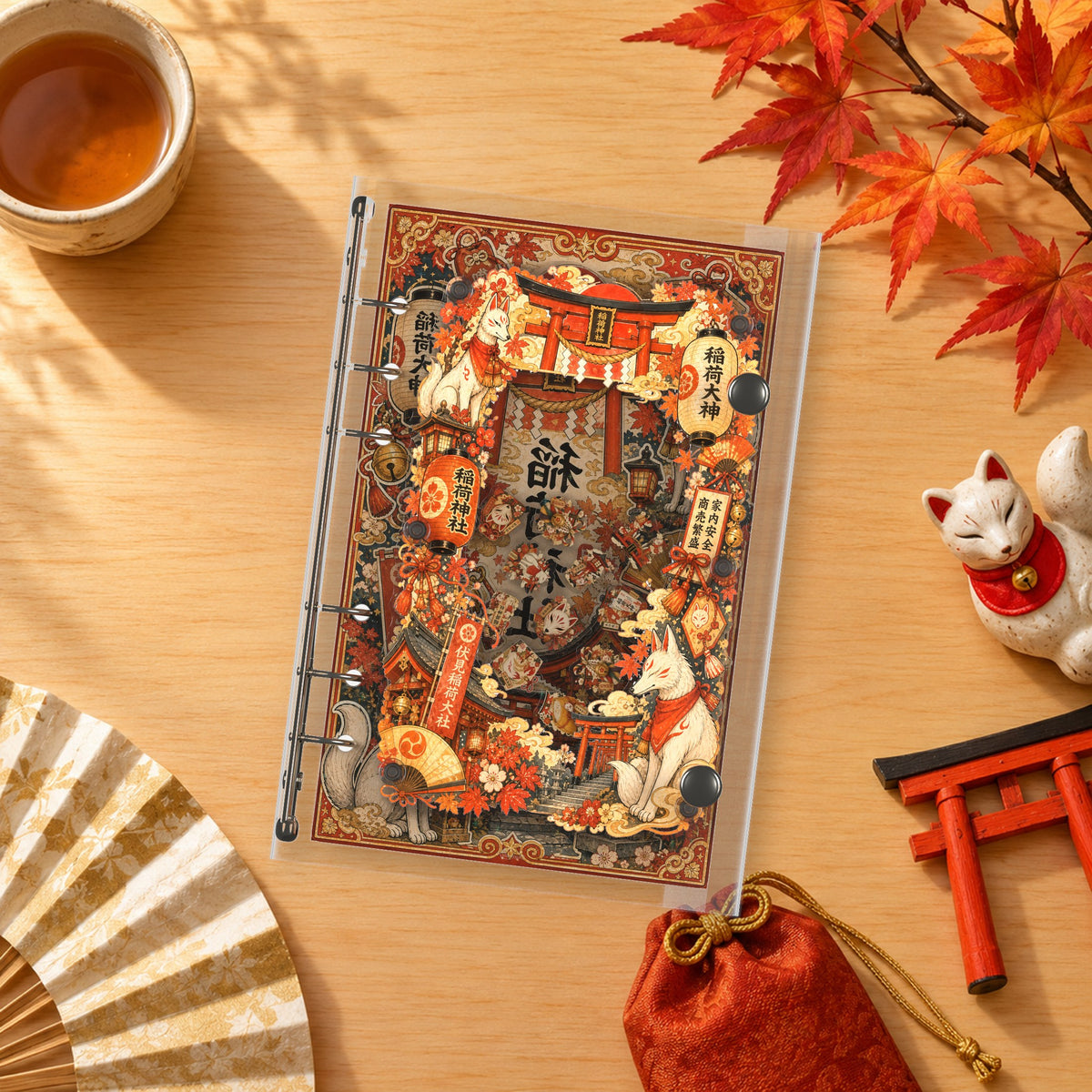 Inari Shrine shaker binder on a styled desk