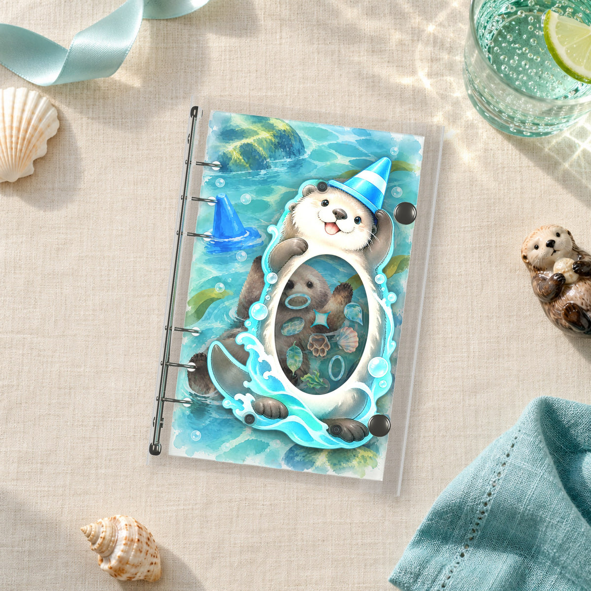 Otter Lagoon shaker binder on a styled desk
