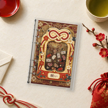 Lucky Charm Knot shaker binder on a styled desk