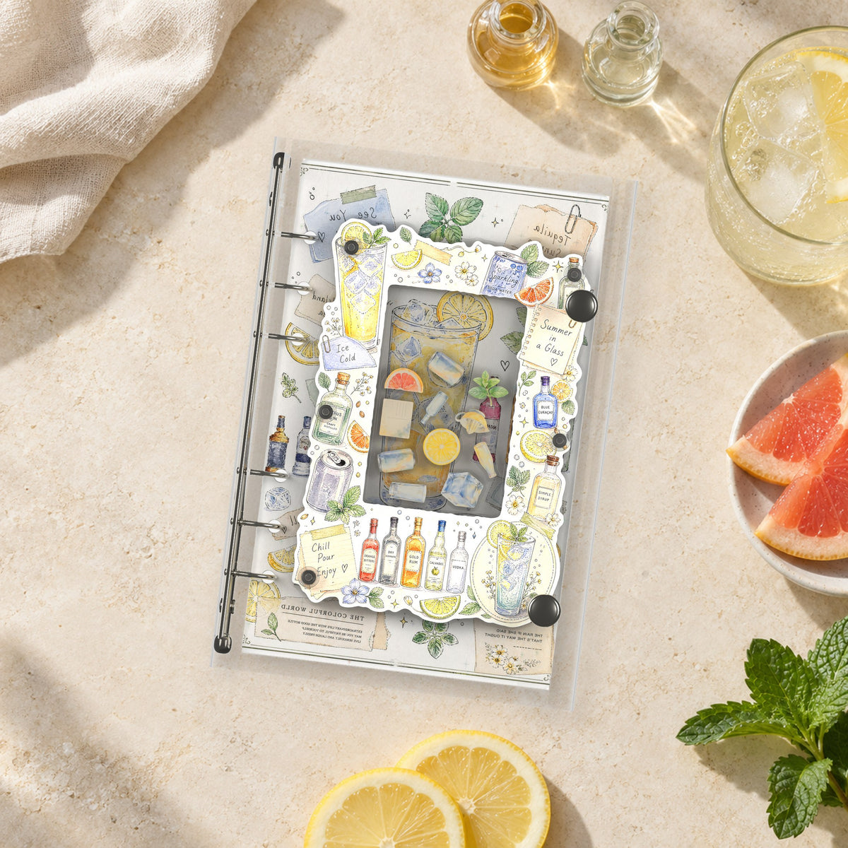 Citrus Drinks shaker binder on a styled desk