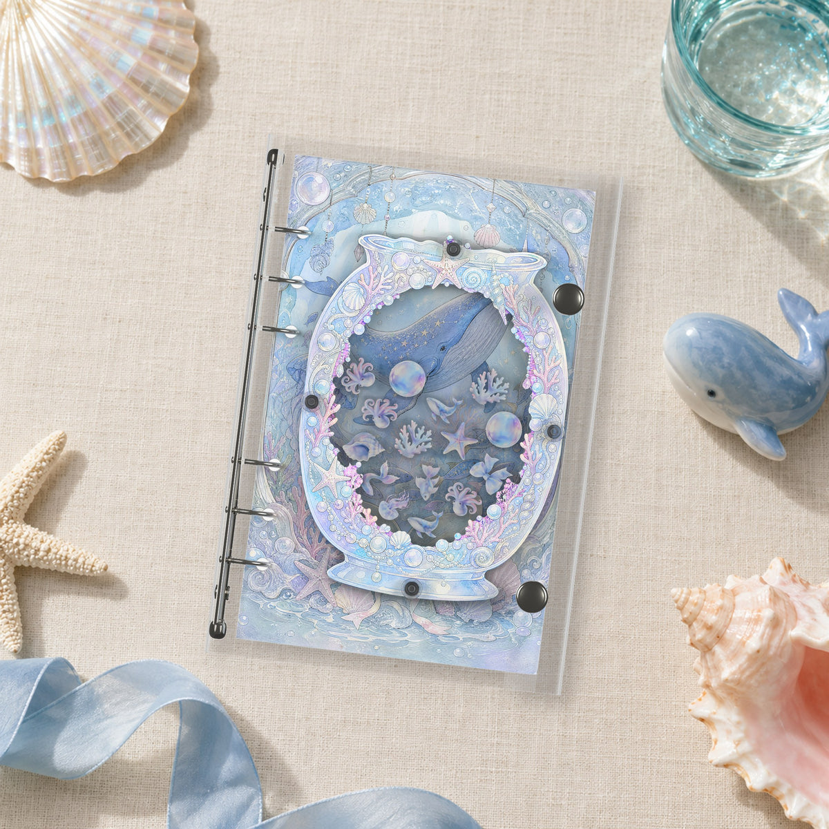 Whale & Coral Jar shaker binder on a styled desk