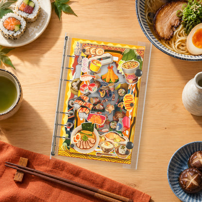 Sushi & Ramen shaker binder on a styled desk