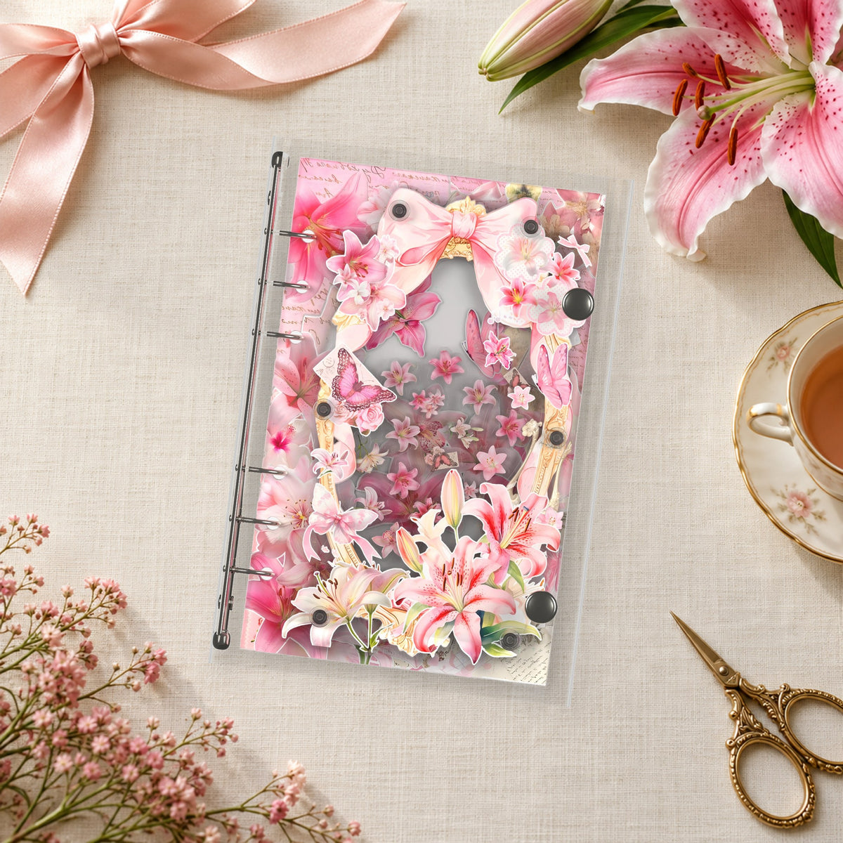 Pink Lilies shaker binder on a styled desk