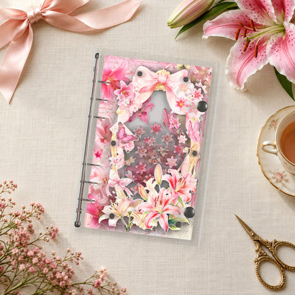 Pink Lilies shaker binder on a styled desk