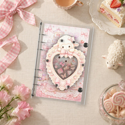 Pink Lamb Sweetheart shaker binder on a styled desk