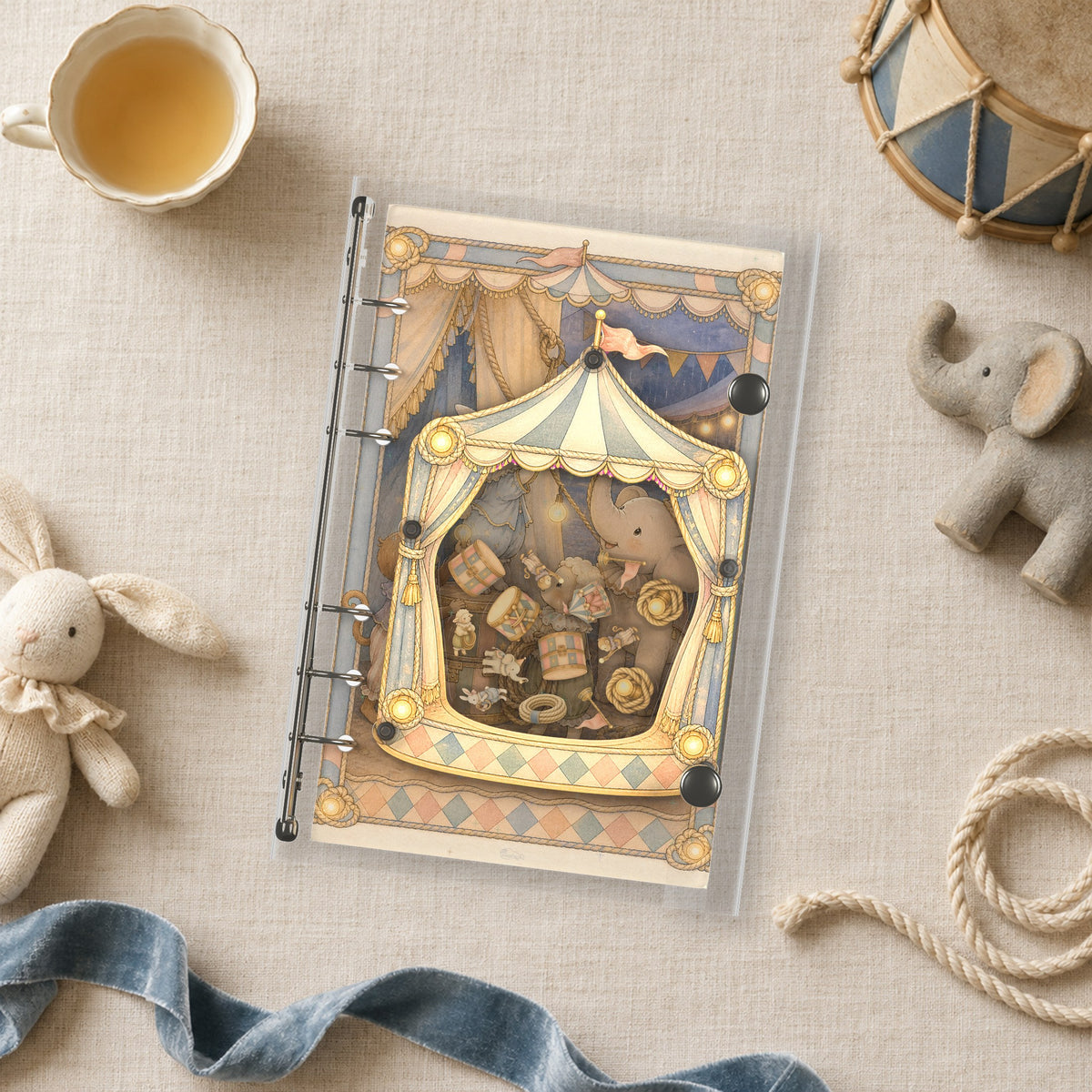 Little Circus Elephant shaker binder on a styled desk