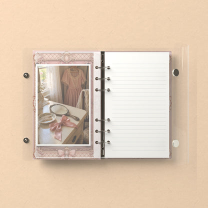 Inside: a photo sleeve and a lined refill page