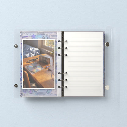 Inside: a photo sleeve and a lined refill page