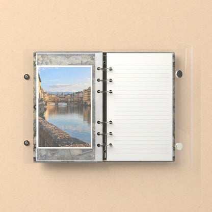 Inside: a photo sleeve and a lined refill page