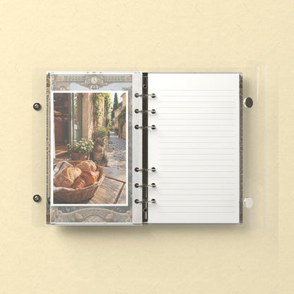 Inside: a photo sleeve and a lined refill page
