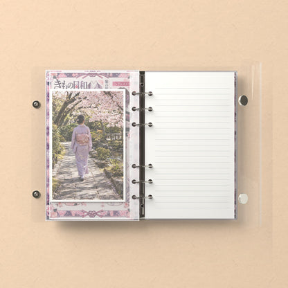 Inside: a photo sleeve and a lined refill page