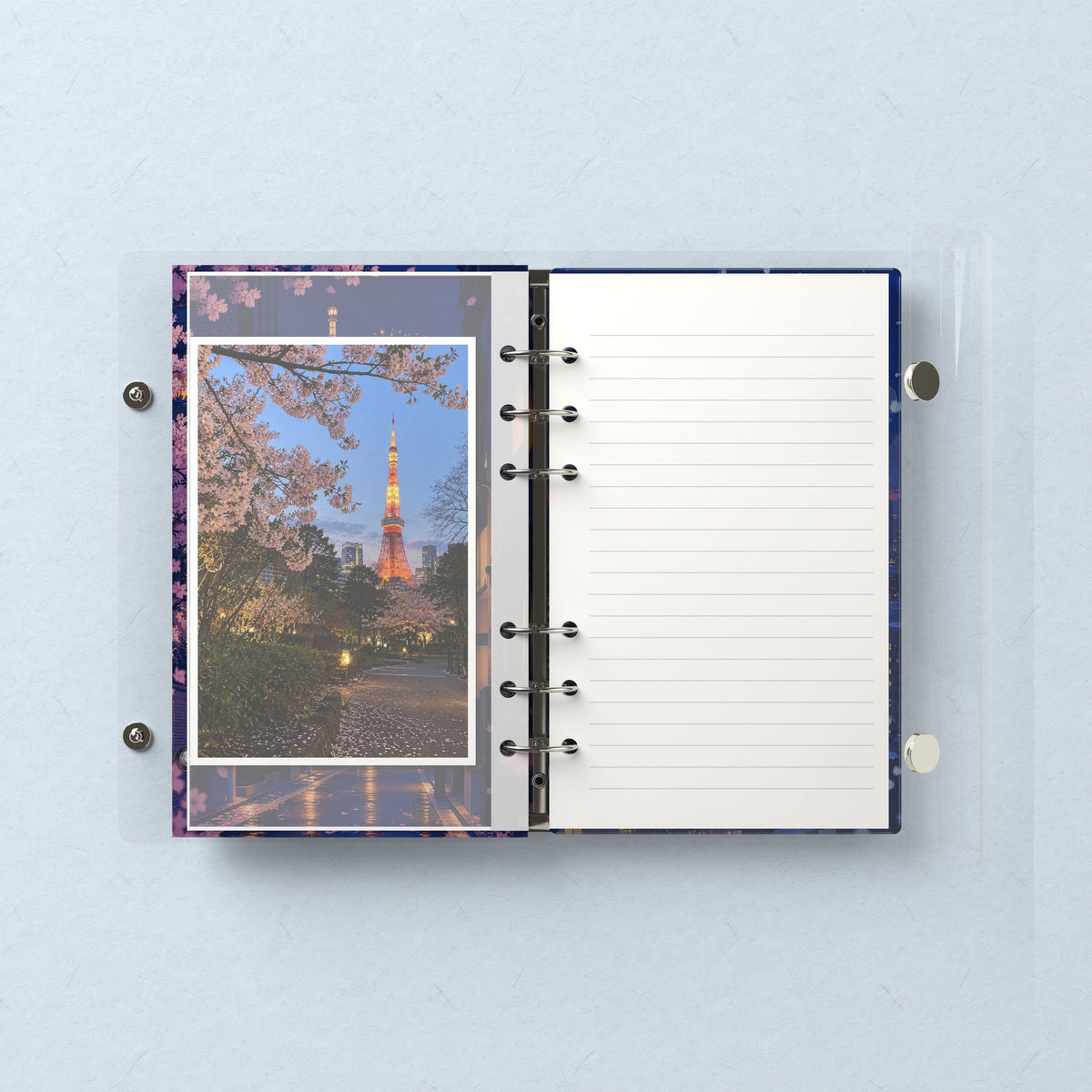 Inside: a photo sleeve and a lined refill page