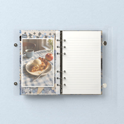 Inside: a photo sleeve and a lined refill page