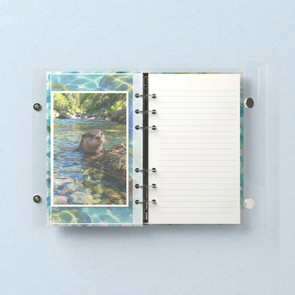 Inside: a photo sleeve and a lined refill page