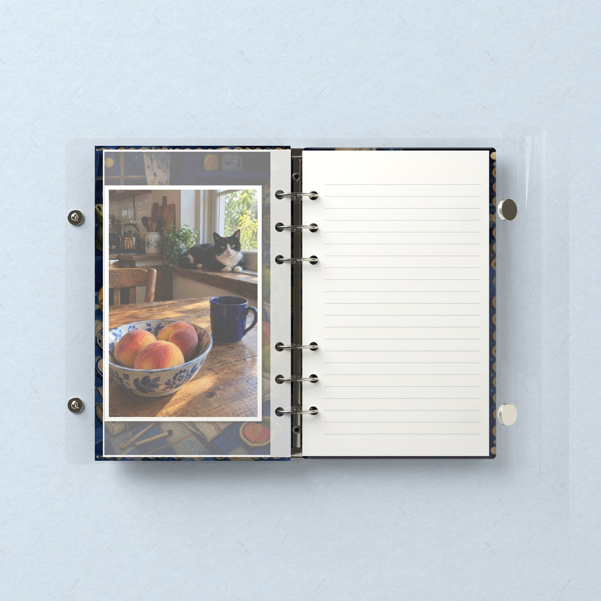 Inside: a photo sleeve and a lined refill page