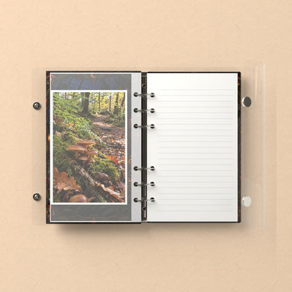 Inside: a photo sleeve and a lined refill page
