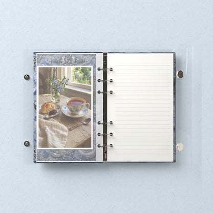 Inside: a photo sleeve and a lined refill page