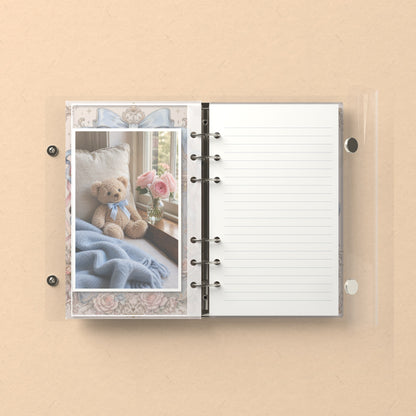 Inside: a photo sleeve and a lined refill page