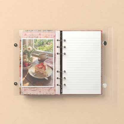 Inside: a photo sleeve and a lined refill page