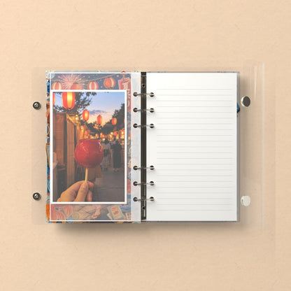 Inside: a photo sleeve and a lined refill page