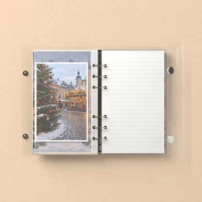 Inside: a photo sleeve and a lined refill page