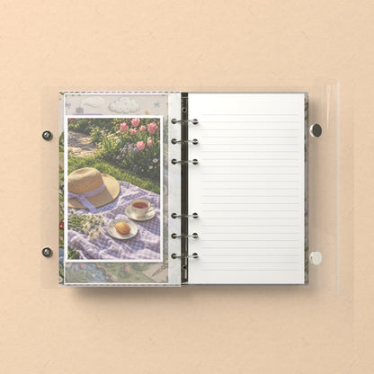 Inside: a photo sleeve and a lined refill page