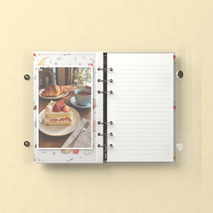 Inside: a photo sleeve and a lined refill page