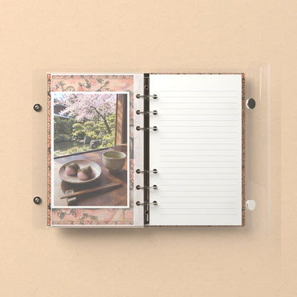 Inside: a photo sleeve and a lined refill page