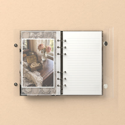 Inside: a photo sleeve and a lined refill page