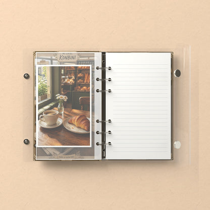 Inside: a photo sleeve and a lined refill page