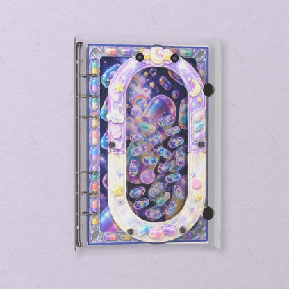 Dream Capsule shaker notebook: the charms tumble when you shake it